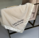Luxurious ivory personalized blanket with ultra-soft plush fabric on both sides, silky satin trim, and custom embroidered name and date.
Font: Gil Sans MT Thread Color: Chocolate Brown #Font:Ariel Thread Color #2142