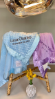 Custom baby blankets with flat or ruffle satin border, soft plush fabric, and personalized embroidery with name and birth date.