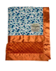 Blue floral Pima cotton baby blanket with bright orange minky dot back and satin border. Custom embroidery option available.