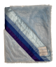 Sky Luxe baby blanket with deep blue shadow rainbow satin trim, stroller size, ultra-soft and cozy plush for babies during naps or on the go.