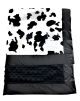 Cow print black and white Minky stroller blanket with plush black Minky dot back and silky black satin border, ultra-soft and stylish.

