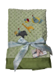 Soft sage green minky dot baby blanket with satin trim, featuring adorable embroidered party animals—lion, giraffe, and elephant with balloons.