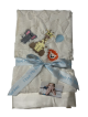 Soft cream Luxe Bella baby blanket with satin trim, featuring adorable embroidered baby animals—lion, giraffe, and elephant with a balloon.