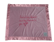 Soft pink Minky blanket with silky satin border and heartfelt embroidered message, "Think of this blanket as a hug from me to you," in pink thread.