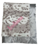 Personalized Siberian Leopard Silver Luxe Blanket with silky satin border, ultra-soft plush fabric, and custom embroidery name "Indiana" in pink.