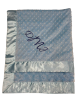 Personalized Minky Dot Luxe Baby Blanket in light blue with a satin border, embroidered initials "MJ" in navy script.