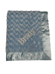 Personalized baby blanket in soft blue with luxe rose texture, satin border, and custom embroidery name "Brady" in elegant script.