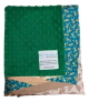 Minky Dot Kelly Green baby blanket with plush texture and a vibrant Sofia satin border, offering warmth, softness, and a stylish design.