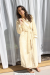 Luxurious women's Luxe Bella reversible robe with ultra-soft plush fabric and satin lining, perfect for comfort, style, and relaxation.

