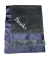 Personalized Minky Dot Luxe Blanket in black with navy satin border and soft fur lining, embroidered with the name "Brooks" in white.