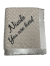 Personalized ivory luxe rose baby receiving blanket with embroidered text "Nicole You are loved" in cursive, soft plush fabric.