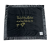 Black Minky Blanket with silky satin border, ultra-soft plush texture, and gold embroidered message "Think of this blanket as a hug from me to you."